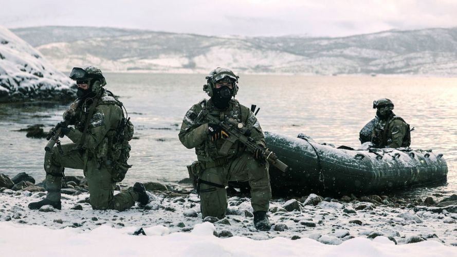 Royal Marines execute extraction under fire in the freezing waters